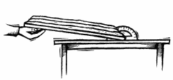 Illustration of Foam Board Model tilted on table, tilt being measured with protractor